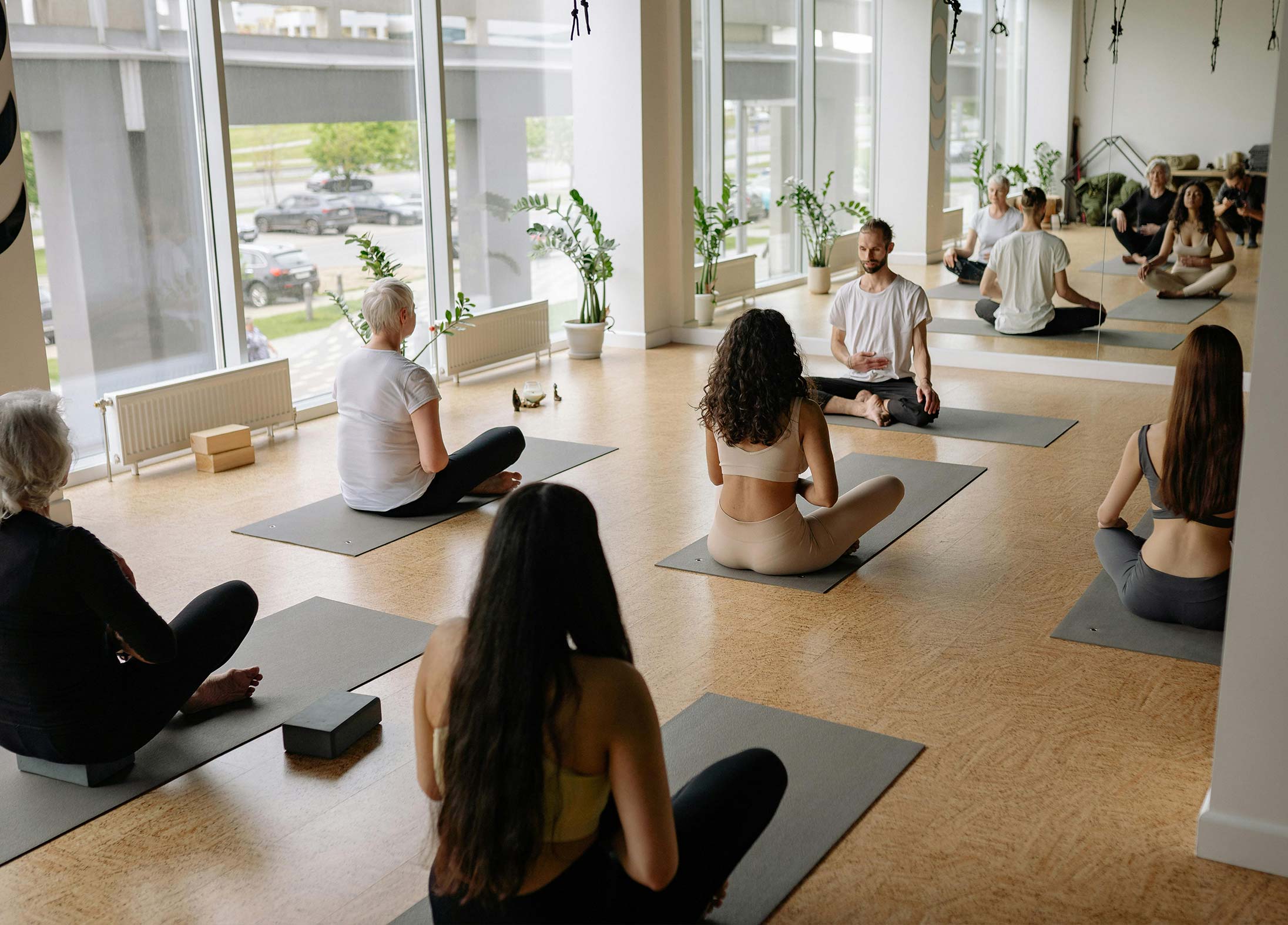 People stretching in a yoga class