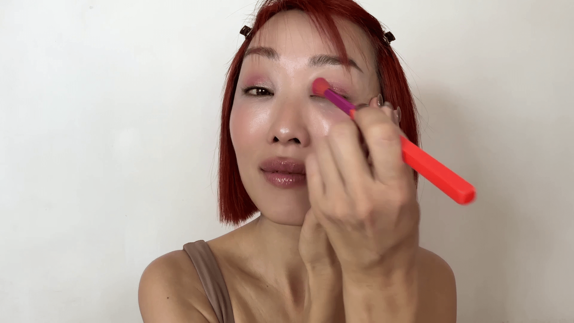 A makeup artist creating a Valentine's Day eye look