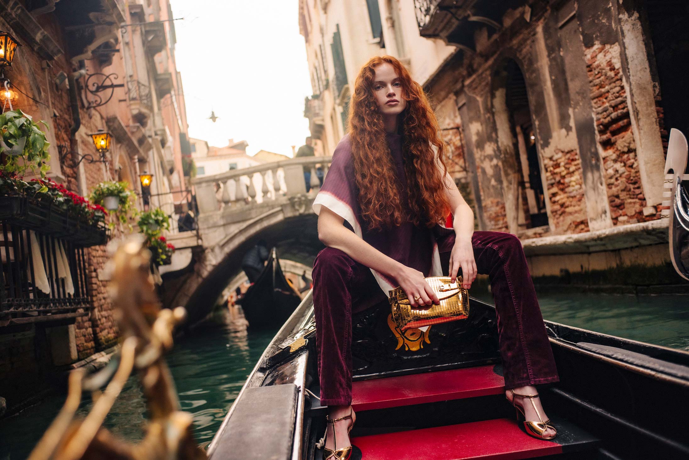 A model poses in Ferragamo in Venice