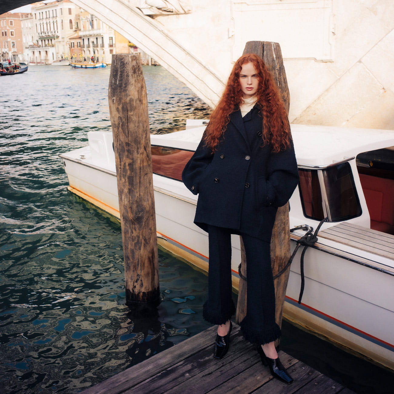 A model poses in Bottega Veneta in Venice