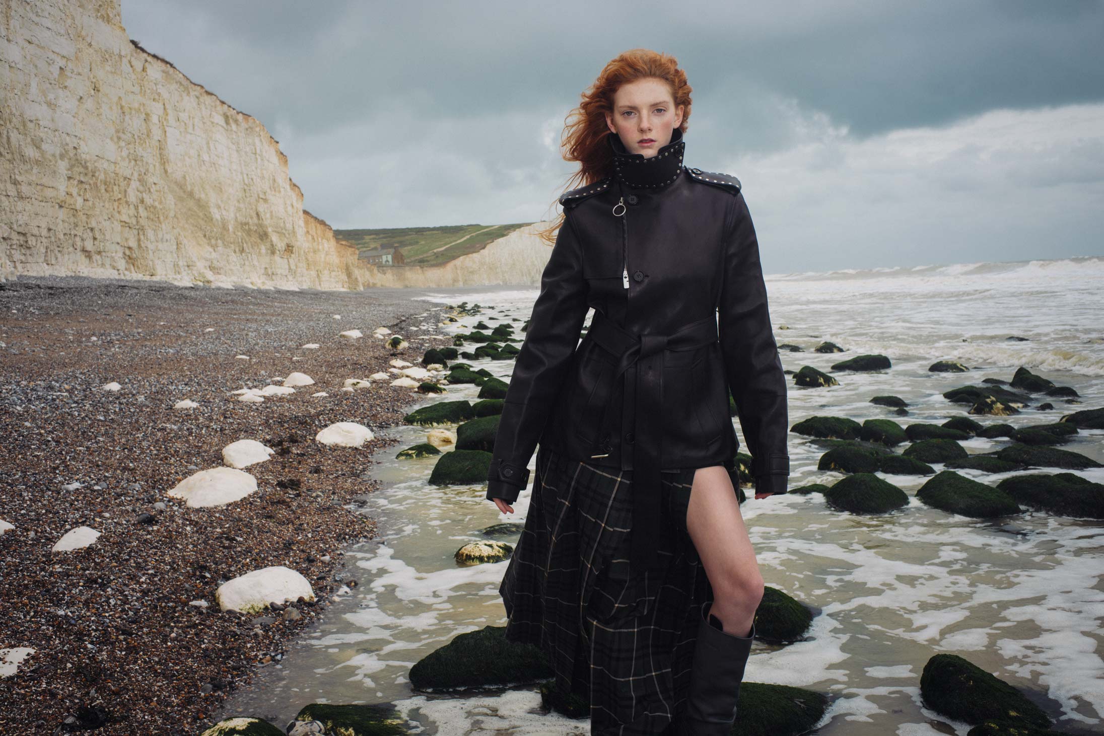 A model poses in Burberry at Seven Sisters in England